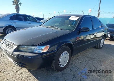1999 Toyota Camry Le from USA, damaged, VIN JT2BG22K8X0292434